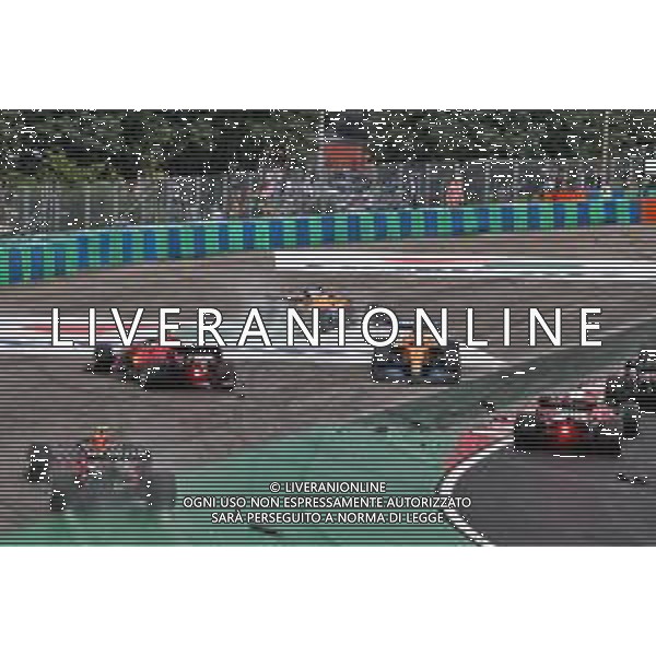 Crash at the start of the race - Sergio Perez (MEX) Red Bull Racing RB16B, Charles Leclerc (MON) Ferrari SF-21; Daniel Ricciardo (AUS) McLaren MCL35M and Lando Norris (GBR) McLaren MCL35M. 01.08.2021. Formula 1 World Championship, Rd 11, Hungarian Grand Prix, Budapest, Hungary, Race Day. - www.xpbimages.com, EMail: requests@xpbimages.com © Copyright: Moy / XPB Images/AGENZIA ALDO LIVERANI SAS - ITALY ONLY EDITORIAL USE ONLY