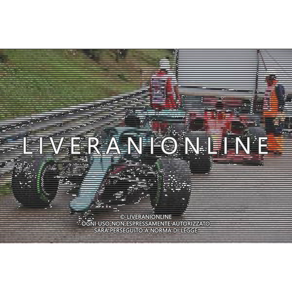 The damaged, retired cars of Lance Stroll (CDN) Aston Martin F1 Team AMR21 and Charles Leclerc (MON) Ferrari. 01.08.2021. Formula 1 World Championship, Rd 11, Hungarian Grand Prix, Budapest, Hungary, Race Day. - www.xpbimages.com, EMail: requests@xpbimages.com © Copyright: Batchelor / XPB Images/AGENZIA ALDO LIVERANI SAS - ITALY ONLY EDITORIAL USE ONLY