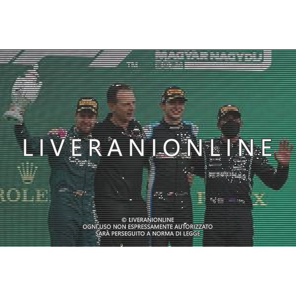 2nd Sebastian Vettel (GER) Aston Martin F1 Team AMR21 with Laurent Rossi (FRA) Alpine Chief Executive Officer, 1st place Esteban Ocon (FRA) Alpine F1 Team A521. and 3rd place Lewis Hamilton (GBR) Mercedes AMG F1 W12. 01.08.2021. Formula 1 World Championship, Rd 11, Hungarian Grand Prix, Budapest, Hungary, Race Day. - www.xpbimages.com, EMail: requests@xpbimages.com © Copyright: Batchelor / XPB Images/AGENZIA ALDO LIVERANI SAS - ITALY ONLY EDITORIAL USE ONLY