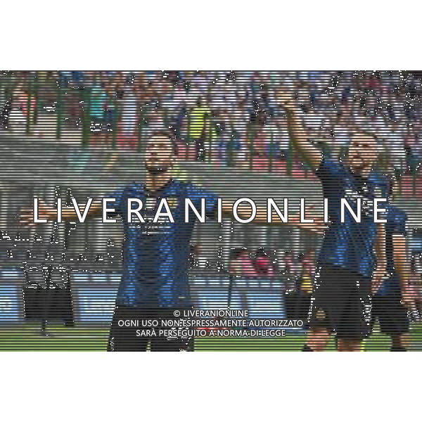 Hakan Calhanoglu (Inter) e Milan Skriniar (Inter) esultano dopo il gol del 2 a 0 Inter vs Genoa Campionato Serie A TIM - 1a giornata Milano 21-08-2021 Stadio Giuseppe Meazza - San Siro foto Roberto Garavaglia/ag. Aldo Liverani sas /AGENZIA ALDO LIVERANI SAS