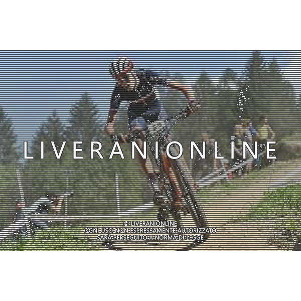 ¬© TVRG Paul Magnier (Francia) specialita\' Cross Country - gara maschile juniores UCI MTB World Championships 2021 Campionati del Mondo di Mountain Bike 25-29 agosto 2021 Val di Sole Daolasa di Commezzadura (TN) Centro sportivo BikeLand 26 agosto 2021 foto Roberto Garavaglia/ag. Aldo Liverani sas/ AGENZIA ALDO LIVERANI SAS