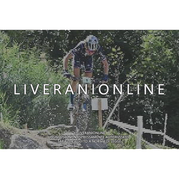 ¬© TVRG Adrien Boichis (Francia) specialita\' Cross Country - gara maschile juniores UCI MTB World Championships 2021 Campionati del Mondo di Mountain Bike 25-29 agosto 2021 Val di Sole Daolasa di Commezzadura (TN) Centro sportivo BikeLand 26 agosto 2021 foto Roberto Garavaglia/ag. Aldo Liverani sas/ AGENZIA ALDO LIVERANI SAS