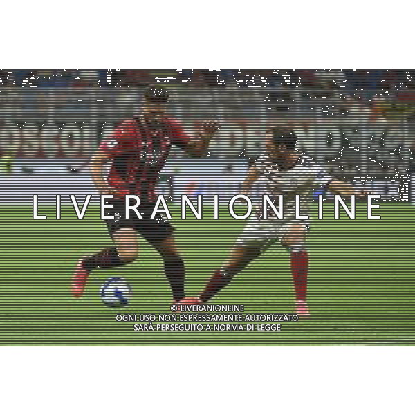 Olivier Giroud (Milan) SX e Diego Godin (Cagliari) DX Milan vs Cagliari Campionato Serie A TIM - 2a giornata Milano 29-08-2021 Stadio Giuseppe Meazza - San Siro foto Roberto Garavaglia/ag. Aldo Liverani sas