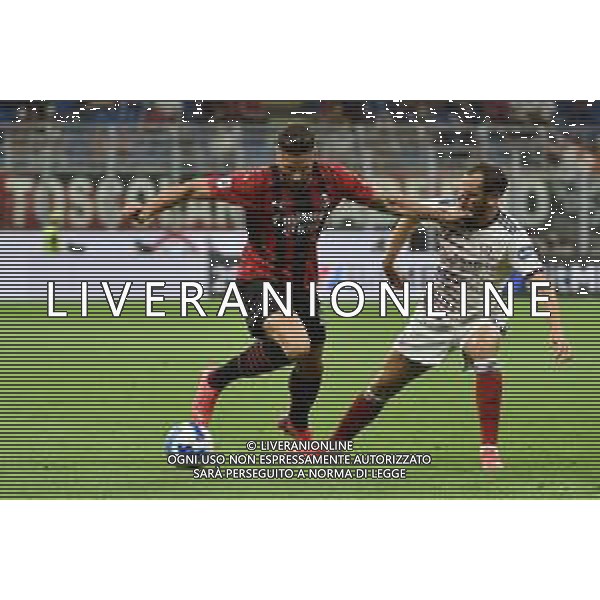 Olivier Giroud (Milan) SX e Diego Godin (Cagliari) DX Milan vs Cagliari Campionato Serie A TIM - 2a giornata Milano 29-08-2021 Stadio Giuseppe Meazza - San Siro foto Roberto Garavaglia/ag. Aldo Liverani sas