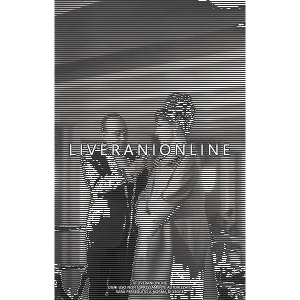 RETROSPETTIVA SORAYA ESFANDIARY BAKHTIARI REGINA DI PERSIA NELLA FOTO SORAYA ESFANDIARY BAKHTIARI PRINCIPESSA DI PERSIA ALLA PRIMA DEL SUO FILM A MILANO IL GIORNO 12-01-1965 CON LELLO BERSANI AG ALDO LIVERANI SAS