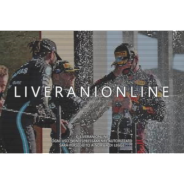 The podium (L to R): second placed Lewis Hamilton (GBR) Mercedes AMG F1 celebrates with third placed Valtteri Bottas (FIN) Mercedes AMG F1 and race winner Max Verstappen (NLD) Red Bull Racing. 05.09.2021. Formula 1 World Championship, Rd 13, Dutch Grand Prix, Zandvoort, Netherlands, Race Day. - www.xpbimages.com, EMail: requests@xpbimages.com © Copyright: Moy / XPB Images/AGENZIA ALDO LIVERANI SAS - ITALY ONLY EDITORIAL USE ONLY