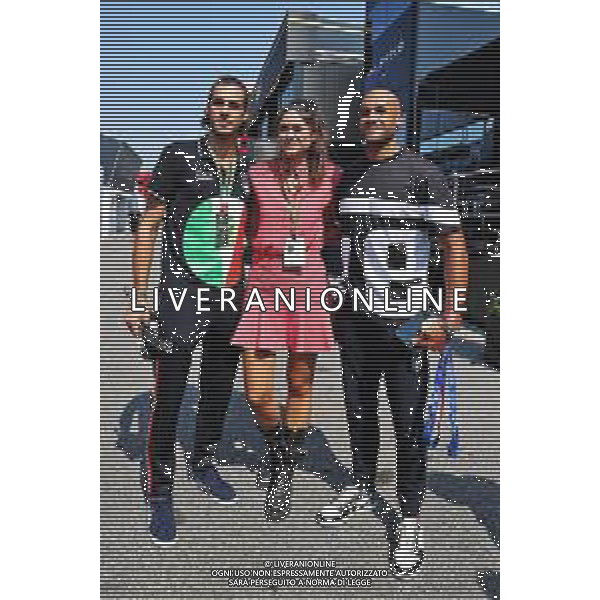 Linda Morselli, girlfriend of Fernando Alonso (ESP) Alpine F1 Team, with Gianmarco Tamberi (ITA) Olympic High Jump Champion (Left) and Lamont Marcell Jacobs (ITA) Olympic 100m Champion (Right). 12.09.2021. Formula 1 World Championship, Rd 14, Italian Grand Prix, Monza, Italy, Race Day. - www.xpbimages.com, EMail: requests@xpbimages.com © Copyright: Moy / XPB Images/ AGENZIA ALDO LIVERANI SAS - ITALY ONLY EDITORIAL USE ONLY
