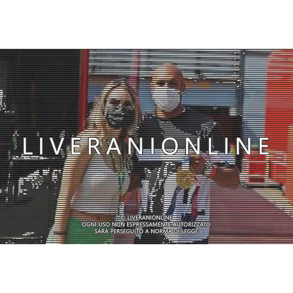 Elena Berri (ITA), girlfriend of Esteban Ocon (FRA) Alpine F1 Team, with Lamont Marcell Jacobs (ITA) 2020 Olympic 100m Champion. 12.09.2021. Formula 1 World Championship, Rd 14, Italian Grand Prix, Monza, Italy, Race Day. - www.xpbimages.com, EMail: requests@xpbimages.com © Copyright: Moy / XPB Images/ AGENZIA ALDO LIVERANI SAS - ITALY ONLY EDITORIAL USE ONLY