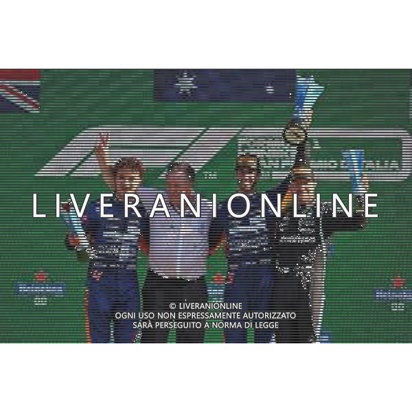 The podium (L to R): Lando Norris (GBR) McLaren MCL35M, second; Zak Brown (USA) McLaren Executive Director; Daniel Ricciardo (AUS) McLaren, race winner; Valtteri Bottas (FIN) Mercedes AMG F1, third. 12.09.2021. Formula 1 World Championship, Rd 14, Italian Grand Prix, Monza, Italy, Race Day. - www.xpbimages.com, EMail: requests@xpbimages.com © Copyright: Batchelor / XPB Images / AGENZIA ALDO LIVERANI SAS - ITALY ONLY - EDITORIAL USE ONLY