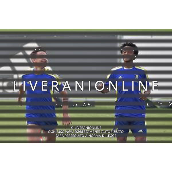 Torino 13.09.2021 JTC Continassa ©Alessandro Falzone/Agenzia Aldo Liverani Allenamento Juventus Prepartita Champions League 2021/2022 Nella foto : Paulo Dybala-Juan Cuadrado ©Falzone/AGENZIA ALDO LIVERANI SAS