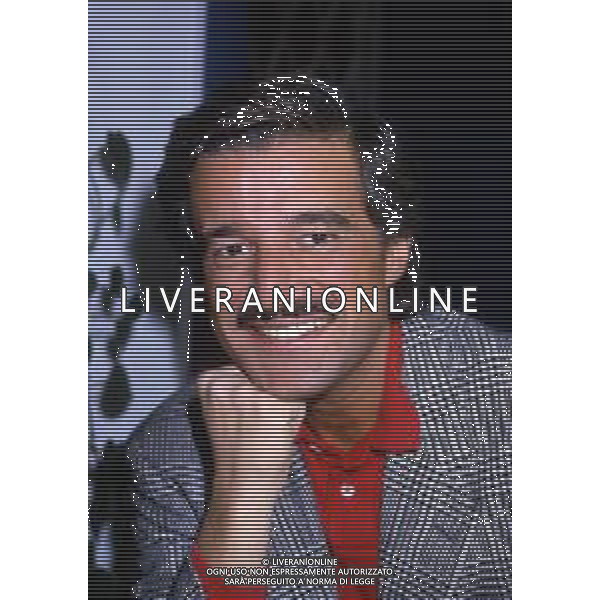 RETROSPETTIVA CHRISTIAN DE SICA ATTORE NELLA FOTO CHRISTIAN DE SICA NELL\'ANNO 1987 A TERRAZZA MARTINI ALLA PRESENTAZIONE DEL FILM“ BELLI FRESCHI“ AG ALDO LIVERANI SAS 