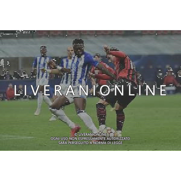 Chancel Mbemba (Porto) e sulla DX Theo Hernandez (Milan) Milan vs Porto UEFA Champions League fase a gironi 4a giornata - gruppo B Milano 03-11-2021 Stadio Giuseppe Meazza - San Siro foto Roberto Garavaglia/ag. Aldo Liverani sas /AGENZIA ALDO LIVERANI SAS