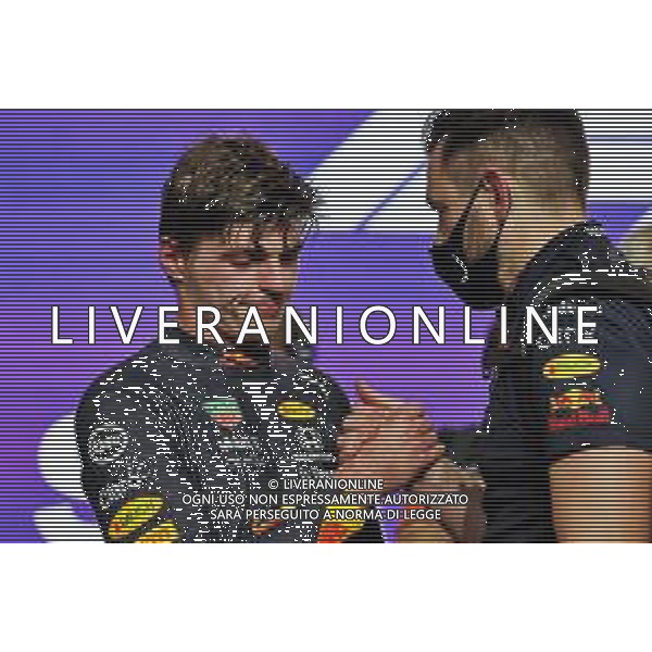 (L to R): Second placed Max Verstappen (NLD) Red Bull Racing with Bradley Scanes (GBR) Red Bull Racing Physio and Performance Coach in parc ferme. 05.12.2021. Formula 1 World Championship, Rd 21, Saudi Arabian Grand Prix, Jeddah, Saudi Arabia, Race Day. - www.xpbimages.com, EMail: requests@xpbimages.com © Copyright: Moy / XPB Images/AGENZIA ALDO LIVERANI SAS - ITALY ONLY EDITORIAL USE ONLY