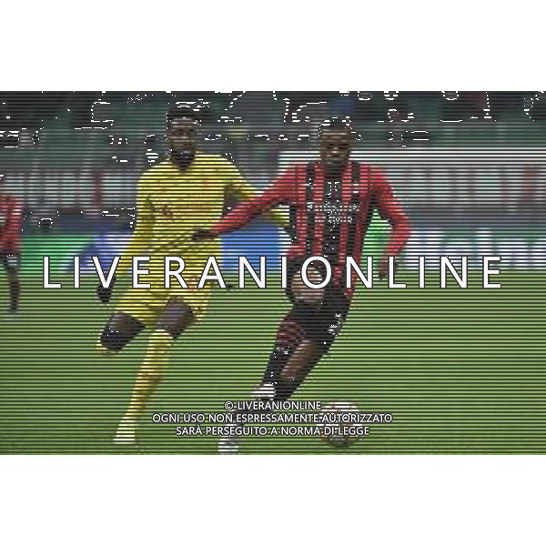 Divock Origi (Liverpool) e Pierre Kalulu (Milan) Milan vs Liverpool UEFA Champions League fase a gironi 6a giornata - gruppo B Milano 07-12-2021 Stadio Giuseppe Meazza - San Siro foto Roberto Garavaglia/ag. Aldo Liverani sas /AGENZIA ALDO LIVERANI SAS