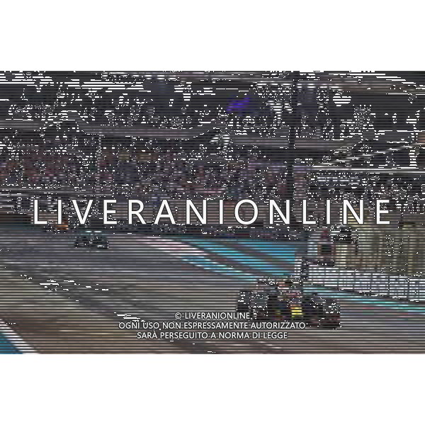 Race winner and World Champion Max Verstappen (NLD) Red Bull Racing RB16B wins the race ahead of second placed Lewis Hamilton (GBR) Mercedes AMG F1 W12. 12.12.2021. Formula 1 World Championship, Rd 22, Abu Dhabi Grand Prix, Yas Marina Circuit, Abu Dhabi, Race Day. - www.xpbimages.com, EMail: requests@xpbimages.com © Copyright: Moy / XPB Images/AGENZIA ALDO LIVERANI SAS - ITALY ONLY EDITORIAL USE ONLY