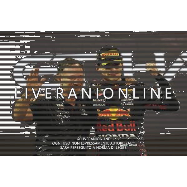 Christian Horner (GBR) Red Bull Racing Team Principal with 1st place and new World Champion, Max Verstappen (NLD) Red Bull Racing RB16B. 12.12.2021. Formula 1 World Championship, Rd 22, Abu Dhabi Grand Prix, Yas Marina Circuit, Abu Dhabi, Race Day. - www.xpbimages.com, EMail: requests@xpbimages.com © Copyright: Batchelor / XPB Images/AGENZIA ALDO LIVERANI SAS - ITALY ONLY EDITORIAL USE ONLY