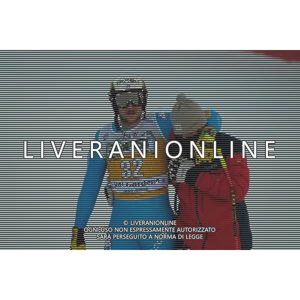 TommasiniR/LMedia - 2021 FIS Ski World Cup - Men&#39;s Downhill - alpine ski race 18 December 2021 - Saslong, Val Gardena, Italy Photo showing: Emanuele Buzzi (ITA) crash at the last jump immediately before the finish line. @TommasiniR/LMedia/AGENZIA ALDO LIVERANI SAS