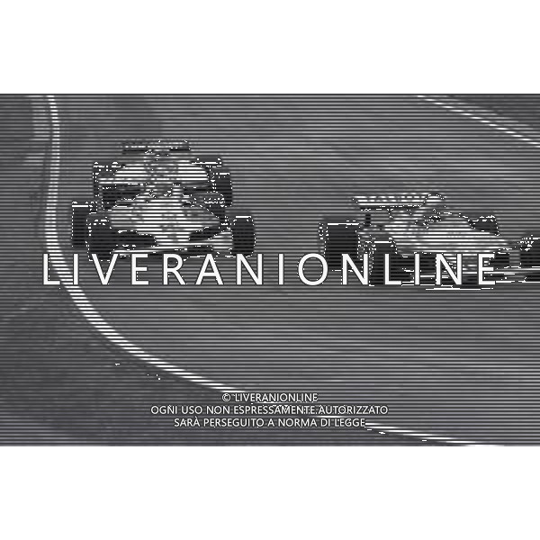 GRAN PREMIO DI SAN MARINO CAMPIONATO MONDIALE DI FORMULA 1, AUTODROMO DI IMOLA 3 MAGGIO 1981 - RETROSPETTIVA Nella foto il pilota Alan Jones su McLaren-Ford Cosworth e Jacques Laffite e Nelson Piquet ©Archivio Giovanni Liverani/AGENZIA ALDO LIVERANI SAS