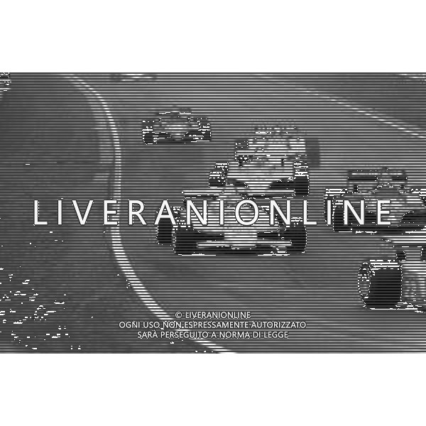 GRAN PREMIO DI SAN MARINO CAMPIONATO MONDIALE DI FORMULA 1, AUTODROMO DI IMOLA 3 MAGGIO 1981 - RETROSPETTIVA Nella foto il pilota Bruno Giacomelli su Alfa Romeo, Michele Alboreto e Andrea De Cesaris ©Archivio Giovanni Liverani/AGENZIA ALDO LIVERANI SAS