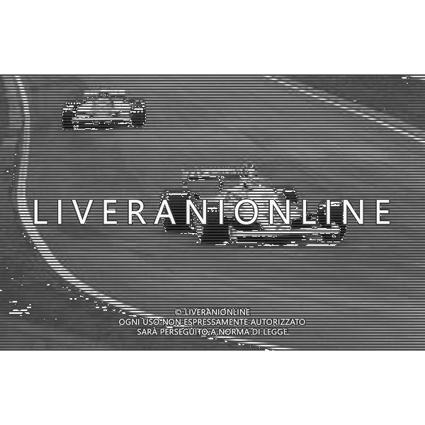 GRAN PREMIO DI SAN MARINO CAMPIONATO MONDIALE DI FORMULA 1, AUTODROMO DI IMOLA 3 MAGGIO 1981 - RETROSPETTIVA Nella foto il pilota Carlos Reutemann su Williams-Ford Cosworth e Riccardo Patrese ©Archivio Giovanni Liverani/AGENZIA ALDO LIVERANI SAS