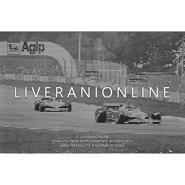GRAN PREMIO DI SAN MARINO CAMPIONATO MONDIALE DI FORMULA 1, AUTODROMO DI IMOLA 3 MAGGIO 1981 - RETROSPETTIVA Nella foto il pilota Gilles Villeneuve su Ferrari e Didier Pironi ©Archivio Giovanni Liverani/AGENZIA ALDO LIVERANI SAS