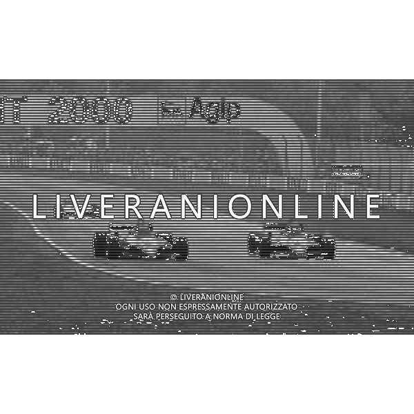 GRAN PREMIO DI SAN MARINO CAMPIONATO MONDIALE DI FORMULA 1, AUTODROMO DI IMOLA 3 MAGGIO 1981 - RETROSPETTIVA Nella foto il pilota Michele Alboreto su Tyrrell-Ford Cosworth e Eddie Cheever ©Archivio Giovanni Liverani/AGENZIA ALDO LIVERANI SAS