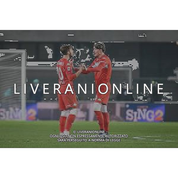 GriffoniE/LMedia - Hellas Verona FC vs ACF Fiorentina - italian soccer Serie A match 2021/2022 22 December 2021 - Marcantonio Bentegodi stadium, Verona, Italy Photo showing: Verona\'s Giancluca Caprari celebrates after scoring a goal 1-1 with Fiorentina\'s Dusan Vlahovic @GriffoniE/LMedia/AGENZIA ALDO LIVERANI SAS