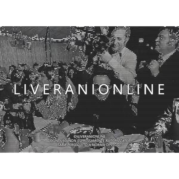 RETROSPETTIVA PADRE ELIGIO PSEUDONIMO DI PADRE ANGELO GELMINI ASSISTENTE SPIRITUALE  NELLA FOTO PADRE ELIGIO A UNA FUNZIONE NELL\'ANNO 1974 CON NEREO ROCCO E GIANNI RIVERA AG ALDO LIVERANI SAS 