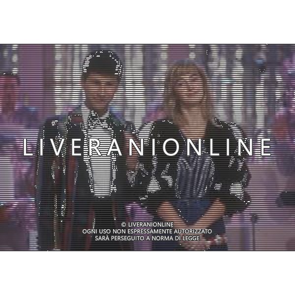 RETROSPETTIVA FABIO FAZIO CONDUTTORE TELEVISIVO - AUTORE TELEVISIVO-IMITATORE-SCRITTORE E DOPPIATORE TELEVISIVO NELLA FOTO FABIO FAZIO NELLA TRASMISSIONE TELEVISIVA“FATE IL VOSTRO GIOCO“ NELL\'ANNO 1988 CON B. VILLANI AG ALDO LIVERANI SAS