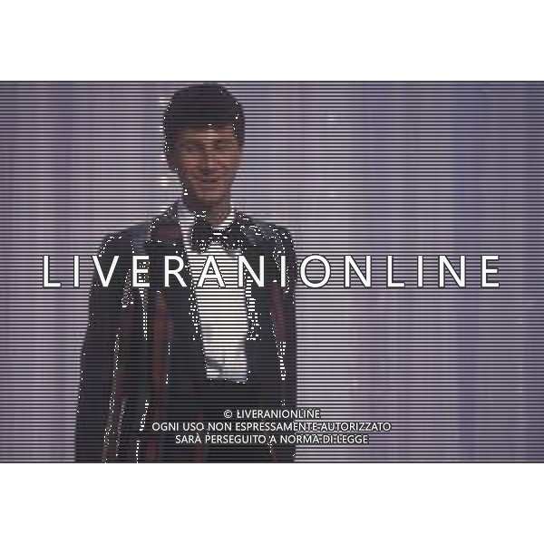 RETROSPETTIVA FABIO FAZIO CONDUTTORE TELEVISIVO - AUTORE TELEVISIVO-IMITATORE-SCRITTORE E DOPPIATORE TELEVISIVO NELLA FOTO FABIO FAZIO NELLA TRASMISSIONE TELEVISIVA“FATE IL VOSTRO GIOCO“ NELL\'ANNO 1988 AG ALDO LIVERANI SAS