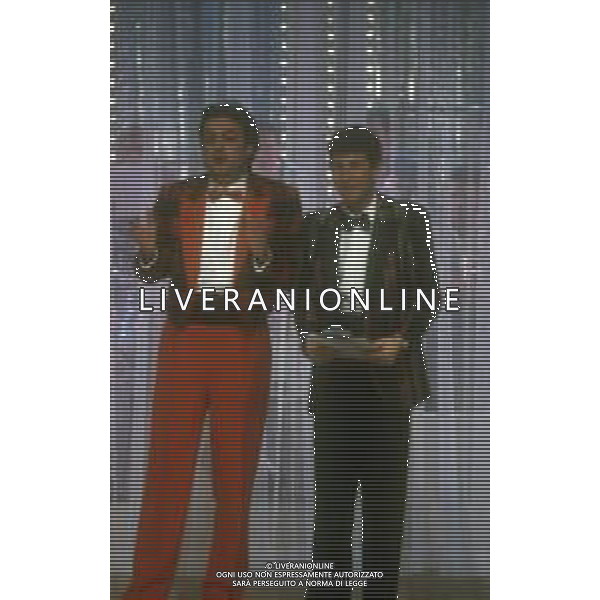 RETROSPETTIVA FABIO FAZIO CONDUTTORE TELEVISIVO - AUTORE TELEVISIVO-IMITATORE-SCRITTORE E DOPPIATORE TELEVISIVO NELLA FOTO FABIO FAZIO NELLA TRASMISSIONE TELEVISIVA“FATE IL VOSTRO GIOCO“ NELL\'ANNO 1988 CON GIANNI CIARDO AG ALDO LIVERANI SAS