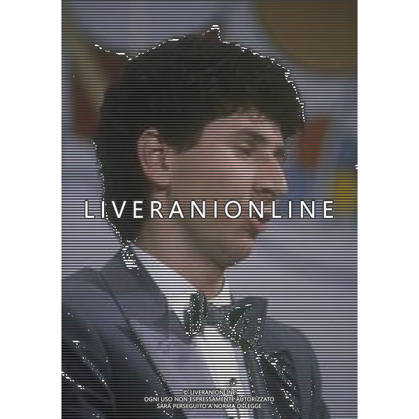 RETROSPETTIVA FABIO AGOSTINO FRANCESCO FAZIO CONDUTTORE TELEVISIVO-IMITATORE-SCRITTORE E PRODUTTORE ARTISTICO NELLA FOTO FABIO FAZIO NELL\'ANNO 1984 NELLA TRASIMISSIONE TELEVISIVA "LORETTA GOGGI IN QUIZ“ AG ALDO LIVERANI SAS