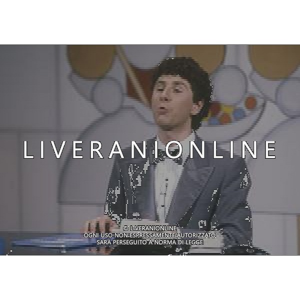 RETROSPETTIVA FABIO AGOSTINO FRANCESCO FAZIO CONDUTTORE TELEVISIVO-IMITATORE-SCRITTORE E PRODUTTORE ARTISTICO NELLA FOTO FABIO FAZIO NELL\'ANNO 1984 NELLA TRASIMISSIONE TELEVISIVA "LORETTA GOGGI IN QUIZ“ AG ALDO LIVERANI SAS