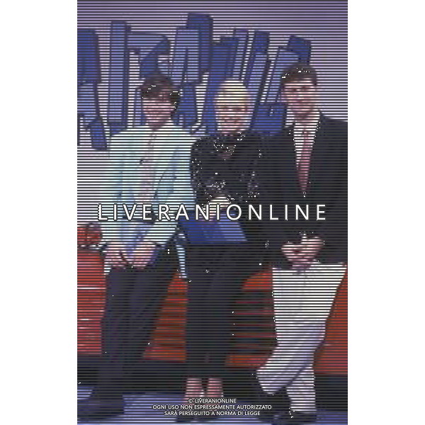 RETROSPETTIVA FABIO AGOSTINO FRANCESCO FAZIO CONDUTTORE TELEVISIVO-IMITATORE-SCRITTORE E PRODUTTORE ARTISTICO NELLA FOTO FABIO FAZIO NELL\'ANNO 1988 NELLA TRASMISSIONE TELEVISIVA “FORZA ITALIA“CON WALTER ZENGA E ROBERTA TERMALI AG ALDO LIVERANI SAS