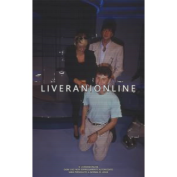 RETROSPETTIVA FABIO AGOSTINO FRANCESCO FAZIO CONDUTTORE TELEVISIVO-IMITATORE-SCRITTORE E PRODUTTORE ARTISTICO NELLA FOTO FABIO FAZIO NELL\'ANNO 1988 NELLA TRASMISSIONE TELEVISIVA “FORZA ITALIA“CON WALTER ZENGA E ROBERTA TERMALI AG ALDO LIVERANI SAS