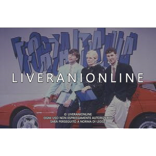 RETROSPETTIVA FABIO AGOSTINO FRANCESCO FAZIO CONDUTTORE TELEVISIVO-IMITATORE-SCRITTORE E PRODUTTORE ARTISTICO NELLA FOTO FABIO FAZIO NELL\'ANNO 1988 NELLA TRASMISSIONE TELEVISIVA “FORZA ITALIA“CON WALTER ZENGA E ROBERTA TERMALI AG ALDO LIVERANI SAS