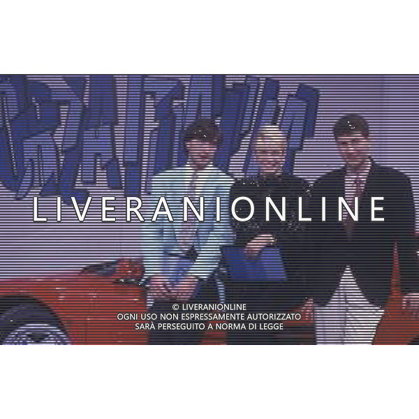 RETROSPETTIVA FABIO AGOSTINO FRANCESCO FAZIO CONDUTTORE TELEVISIVO-IMITATORE-SCRITTORE E PRODUTTORE ARTISTICO NELLA FOTO FABIO FAZIO NELL\'ANNO 1988 NELLA TRASMISSIONE TELEVISIVA “FORZA ITALIA“CON WALTER ZENGA E ROBERTA TERMALI AG ALDO LIVERANI SAS