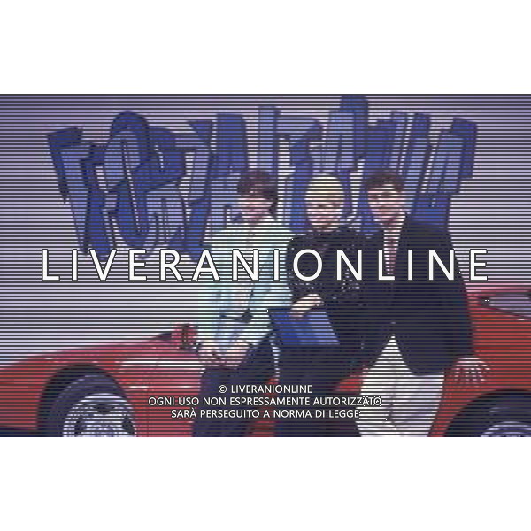 RETROSPETTIVA FABIO AGOSTINO FRANCESCO FAZIO CONDUTTORE TELEVISIVO-IMITATORE-SCRITTORE E PRODUTTORE ARTISTICO NELLA FOTO FABIO FAZIO NELL\'ANNO 1988 NELLA TRASMISSIONE TELEVISIVA “FORZA ITALIA“CON WALTER ZENGA E ROBERTA TERMALI AG ALDO LIVERANI SAS