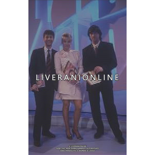 RETROSPETTIVA FABIO AGOSTINO FRANCESCO FAZIO CONDUTTORE TELEVISIVO-IMITATORE-SCRITTORE E PRODUTTORE ARTISTICO NELLA FOTO FABIO FAZIO NELL\'ANNO 1988 NELLA TRASMISSIONE TELEVISIVA “FORZA ITALIA“CON WALTER ZENGA E ROBERTA TERMALI AG ALDO LIVERANI SAS
