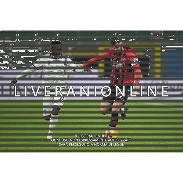 Emmanuel Gyasi (Spezia) SX e Theo Hernandez (Milan) DX Milan vs Spezia Campionato Serie A TIM - 22a giornata Milano 17-01-2022 Stadio Giuseppe Meazza - San Siro foto Roberto Garavaglia/ag. Aldo Liverani sas/AGENZIA ALDO LIVERANI SAS
