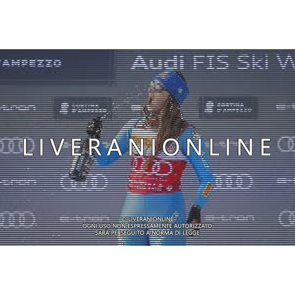 Luca Tedeschi/LMedia - 2022 FIS Ski World Cup - Women\'s Down Hill - alpine ski race January 22 2022 - Olympia slope Cortina d\'Ampezzo, Italy 2022 FIS Ski World Cup - Women\'s Down Hill Photo showing: GOGGIA Sofia (ITA) celebrates after winning the first place on podium @Luca Tedeschi/LiveMedia /AGENZIA ALDO LIVERANI SAS