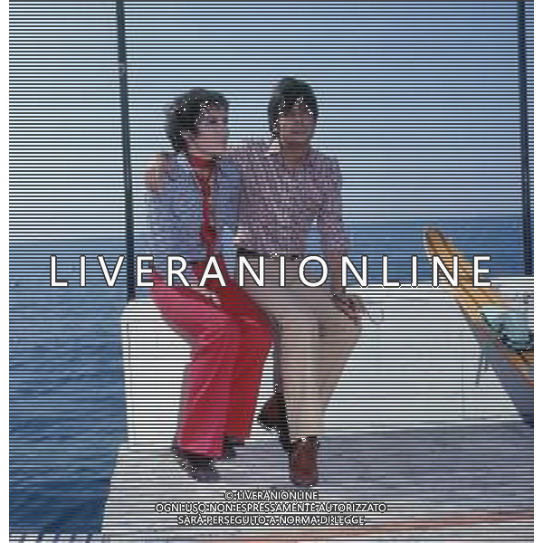 RETROSPETTIVA GIANCARLO GIANNINI ATTORE NELLA FOTO GIANCARLO GIANNINI CON LA MOGLIE LIVIA GIAMPALMO A CANNES NELL\'ANNO 1973 AG ALDO LIVERANI SAS 