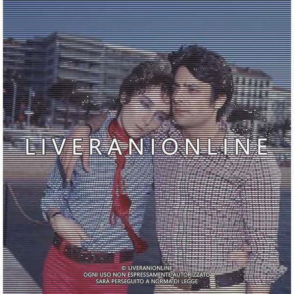 RETROSPETTIVA GIANCARLO GIANNINI ATTORE NELLA FOTO GIANCARLO GIANNINI CON LA MOGLIE LIVIA GIAMPALMO A CANNES NELL\'ANNO 1973 AG ALDO LIVERANI SAS 