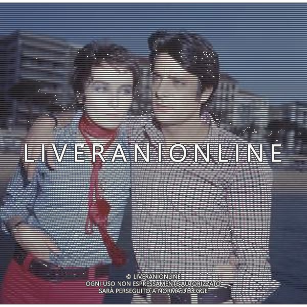 RETROSPETTIVA GIANCARLO GIANNINI ATTORE NELLA FOTO GIANCARLO GIANNINI CON LA MOGLIE LIVIA GIAMPALMO A CANNES NELL\'ANNO 1973 AG ALDO LIVERANI SAS 