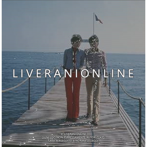 RETROSPETTIVA GIANCARLO GIANNINI ATTORE NELLA FOTO GIANCARLO GIANNINI CON LA MOGLIE LIVIA GIAMPALMO A CANNES NELL\'ANNO 1973 AG ALDO LIVERANI SAS 