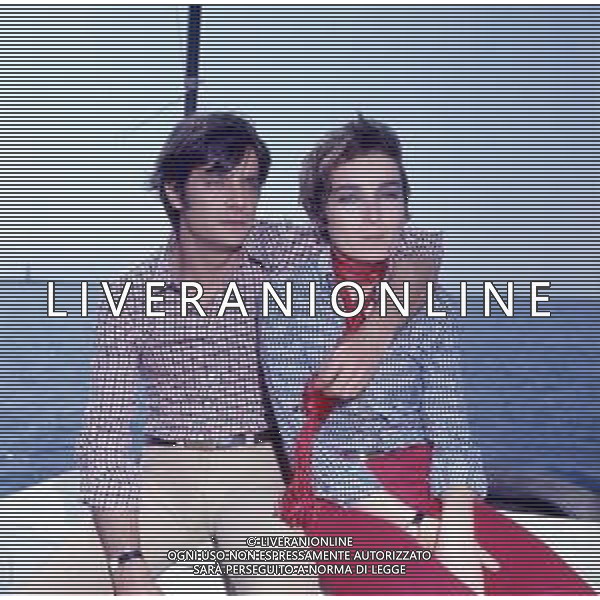 RETROSPETTIVA GIANCARLO GIANNINI ATTORE NELLA FOTO GIANCARLO GIANNINI CON LA MOGLIE LIVIA GIAMPALMO A CANNES NELL\'ANNO 1973 AG ALDO LIVERANI SAS 
