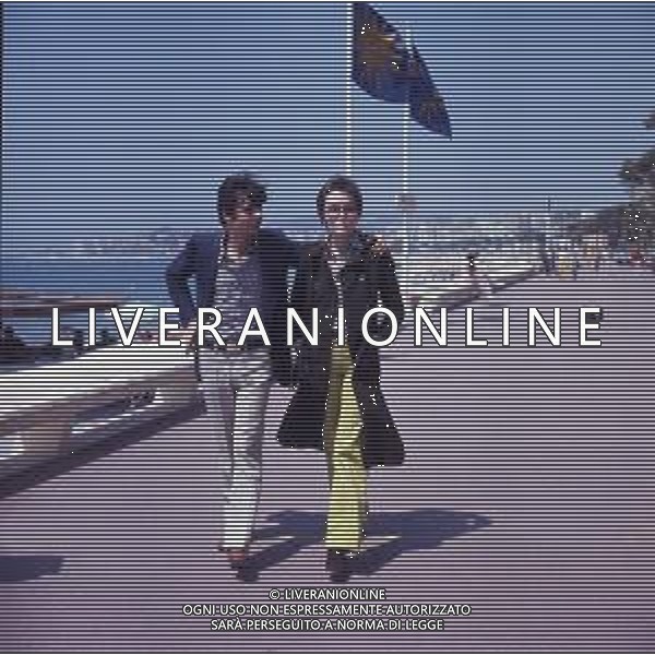 RETROSPETTIVA GIANCARLO GIANNINI ATTORE NELLA FOTO GIANCARLO GIANNINI CON LA MOGLIE LIVIA GIAMPALMO A CANNES NELL\'ANNO 1973 AG ALDO LIVERANI SAS 