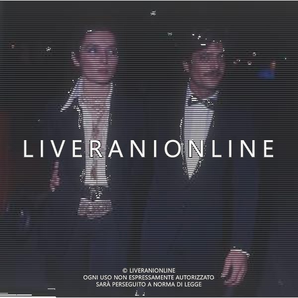 RETROSPETTIVA GIANCARLO GIANNINI ATTORE NELLA FOTO GIANCARLO GIANNINI CON LA MOGLIE LIVIA GIAMPALMO A CANNES NELL\'ANNO 1973 AG ALDO LIVERANI SAS 