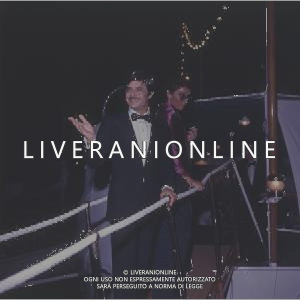 RETROSPETTIVA GIANCARLO GIANNINI ATTORE NELLA FOTO GIANCARLO GIANNINI CON LA MOGLIE LIVIA GIAMPALMO A CANNES NELL\'ANNO 1973 AG ALDO LIVERANI SAS 
