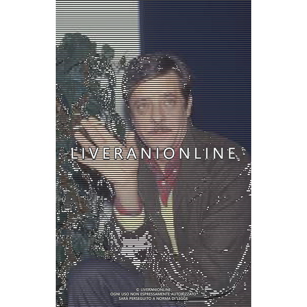 RETROSPETTIVA GIANCARLO GIANNINI ATTORE NELLA FOTO GIANCARLO GIANNINI NELL\'ANNO 1984 IN TERRAZZA MARTINI A MILANO AG ALDO LIVERANI SAS  